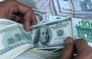 6 banks apologize for dollar overcharging